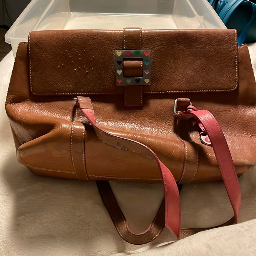 Dooney & Bourke Brown Leather Handbag Heart Buckle has some wear. See pictures